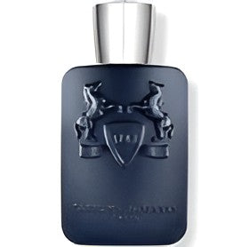A dark navy blue rectangular perfume bottle with a metallic silver cap, featuring an embossed crest design on the front.